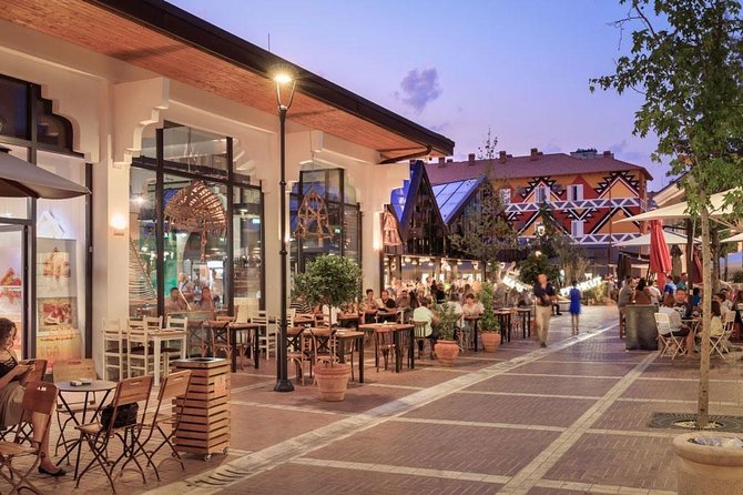 TIRANA Walking Tour: Discover the ever-changing capital city - National Gallery of Art outside: social realism statues and Reja’s Cloud